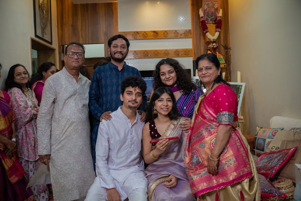 Urvish and Unnati with family at their roka